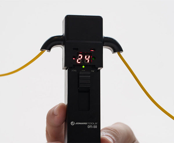 Optical Fiber Identifier - Tool in use identifying fiber - Primus Cable