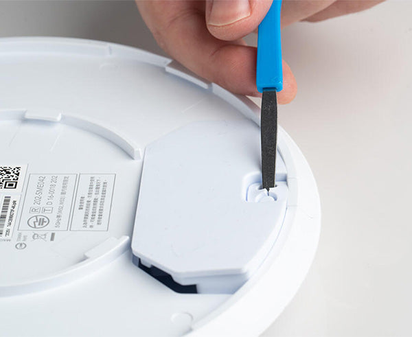 Ubiquiti® Wifi Access Point Unlock & Reset Tool - In use pressing button - Primus Cable