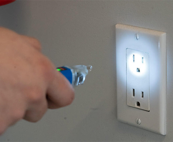 Non-Contact Dual Range Voltage Detector Pen, 24-1000VAC & 90-1000VAC W/LED Flashlight - Flashlight in use on a socket - Primus Cable