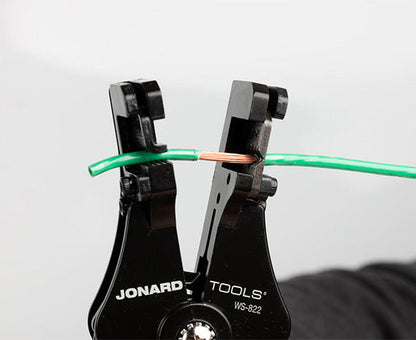 Wire Stripper and Cutter, 8-22 AWG - Stripping green jacket off of copper wire - Primus Cable