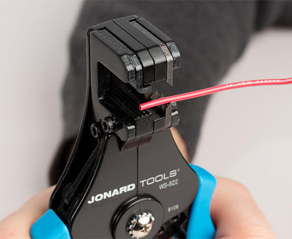 Wire Stripper and Cutter, 8-22 AWG - In use stripping small wire - Primus Cable